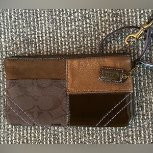Brand new Coach wristlet